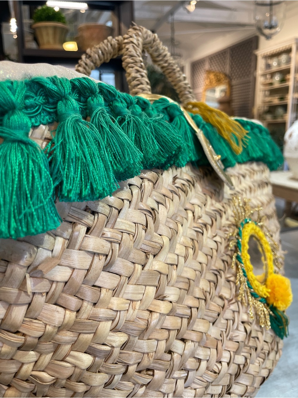 Tizzini x Authentic Provence Woven Straw Tote with Green Fringe and Yellow Poms - Picture 9 of 10
